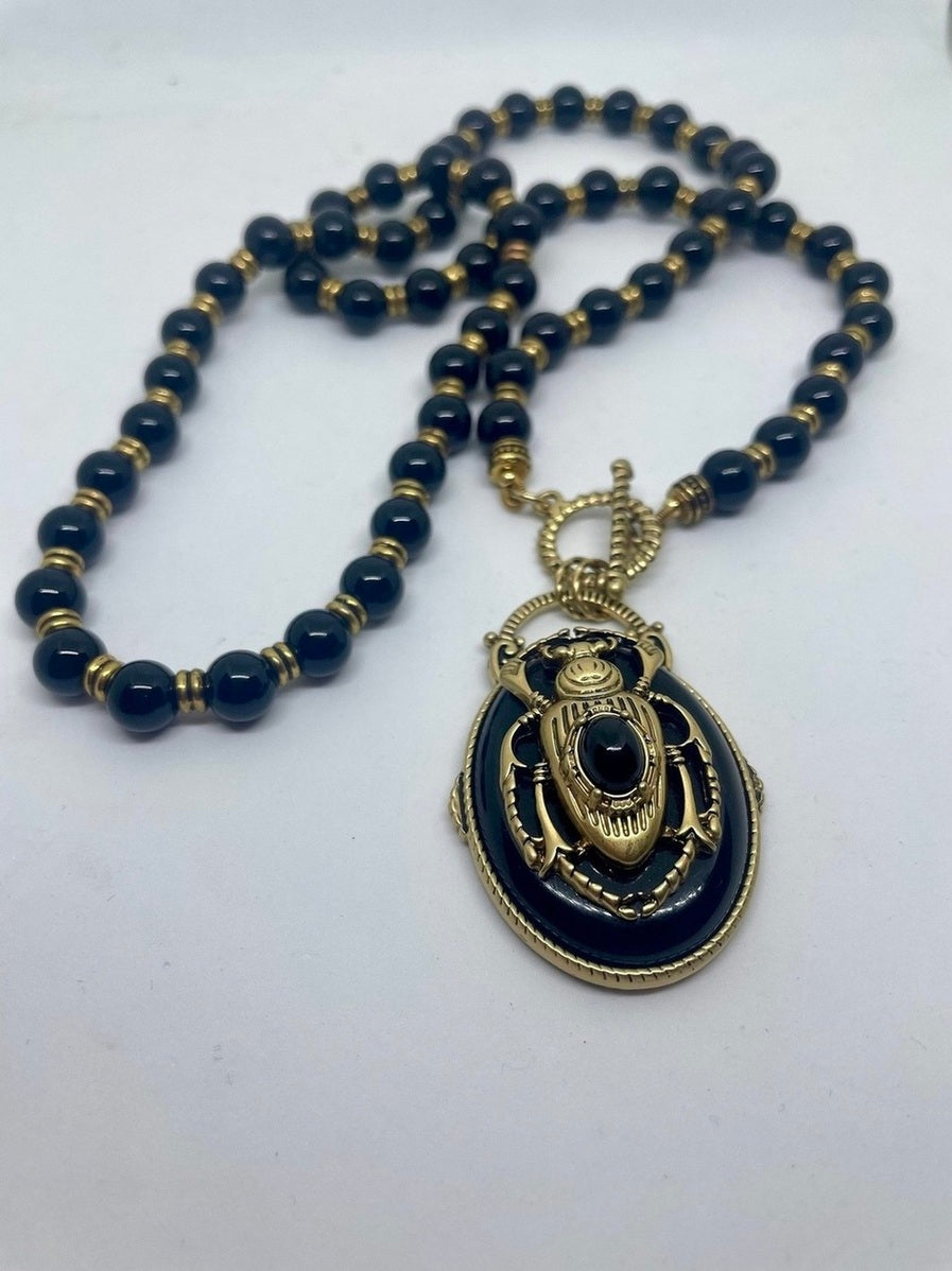 ΚΟΛΙΕ ΜΕ ΣΚΑΡΑΒΑΙΟ ΚΑΙ ΧΑΝΤΡΕΣ BLACK