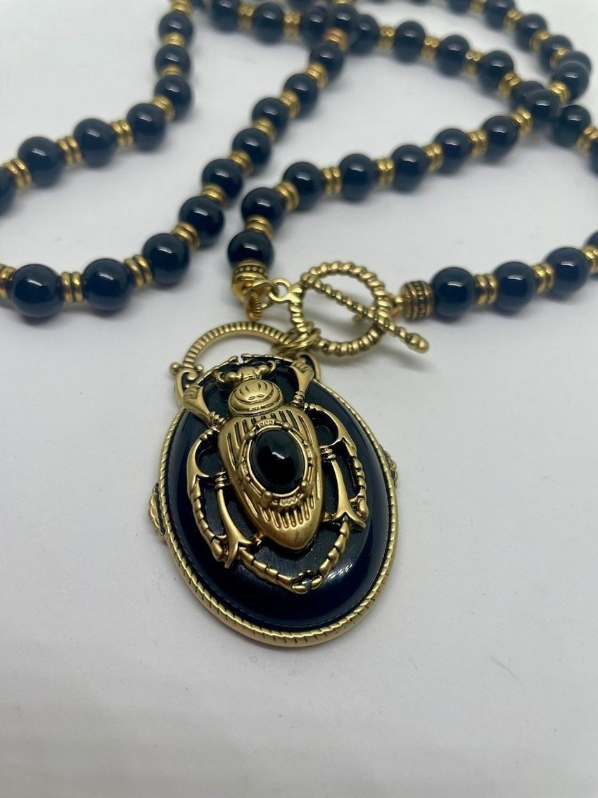 ΚΟΛΙΕ ΜΕ ΣΚΑΡΑΒΑΙΟ ΚΑΙ ΧΑΝΤΡΕΣ BLACK