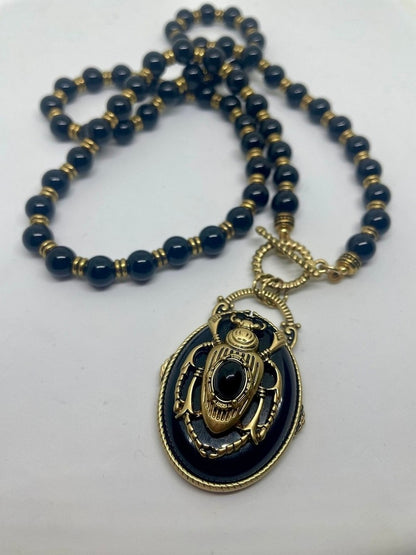 ΚΟΛΙΕ ΜΕ ΣΚΑΡΑΒΑΙΟ ΚΑΙ ΧΑΝΤΡΕΣ BLACK