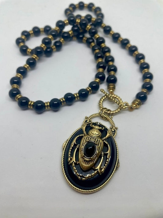 ΚΟΛΙΕ ΜΕ ΣΚΑΡΑΒΑΙΟ ΚΑΙ ΧΑΝΤΡΕΣ BLACK